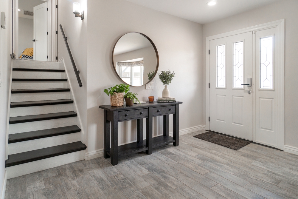 How should mudrooms, hallways, and entryways be designed